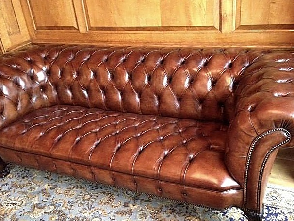 Deep-buttoned leather tufting on a Chesterfield sofa